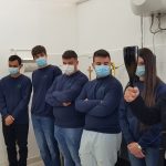 il professor buono con la bottiglia di spumante Diplomato